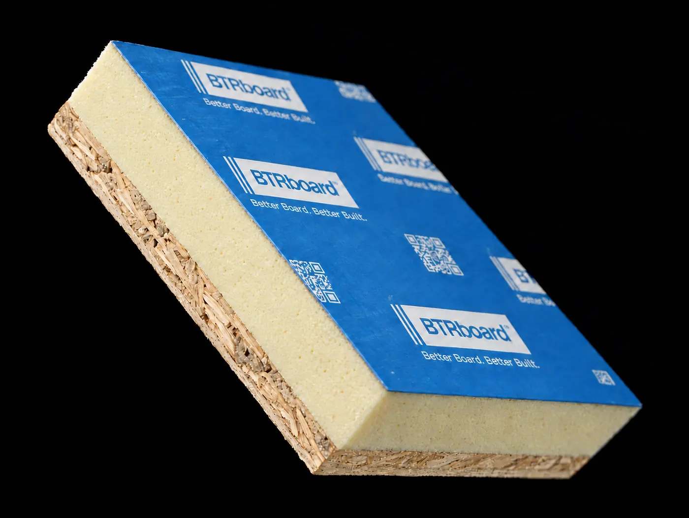 A BTRboard panel on black, showing a thin blue printed facer, a continuous pale yellow foam core with fine grain across both cut edges, and an OSB backing